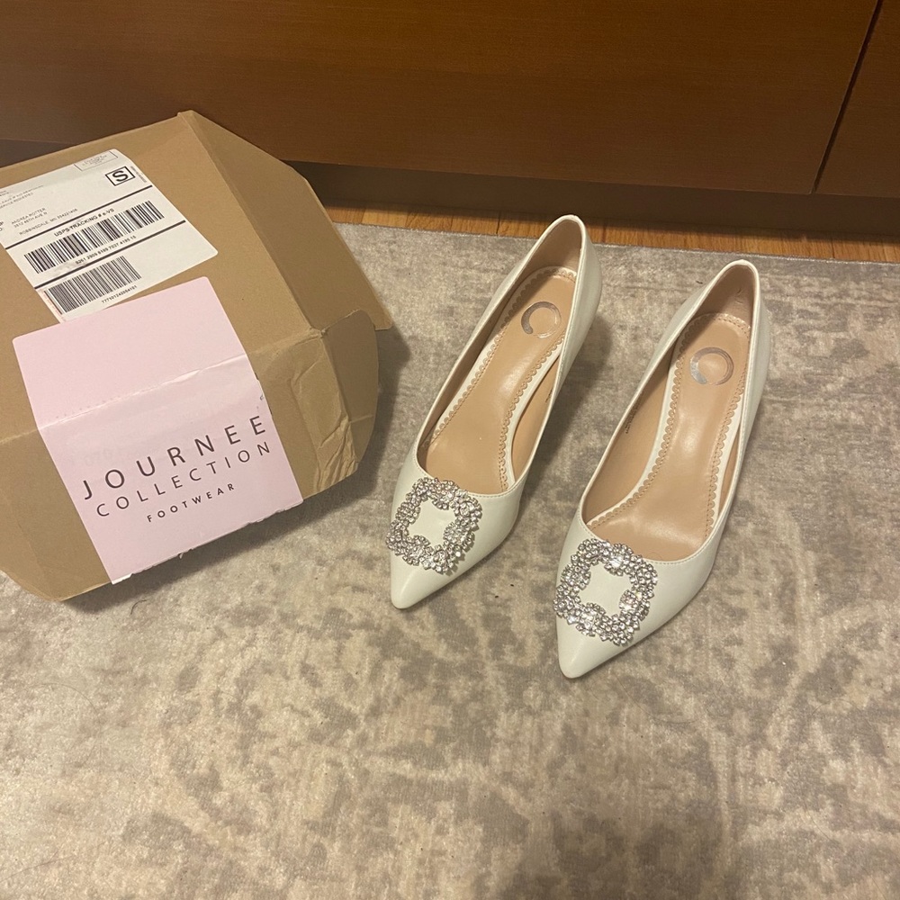 White kitten heels with rhinestones